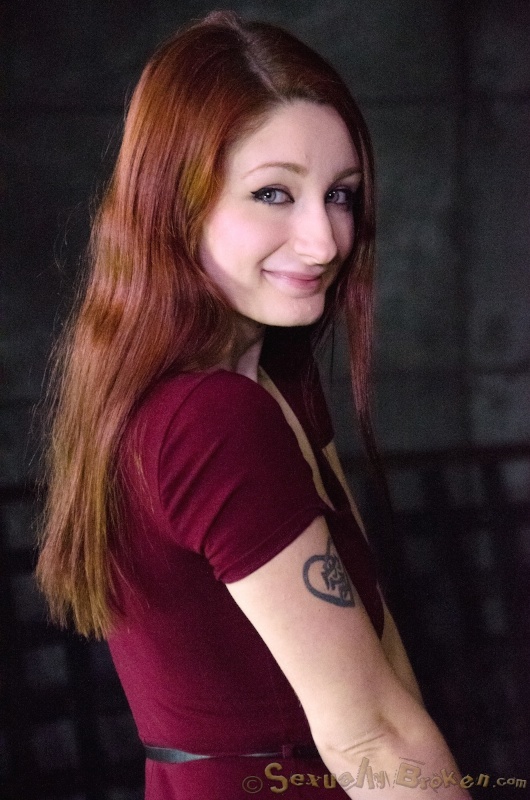 Gagged redhead with green eyes likes domination and sex