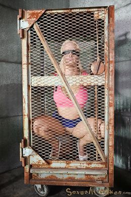 Cuffed blonde with big boobs forced to suck a boner