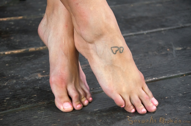 Busty slut fixed in stocks spit roasted by two men