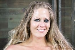 Busty slut fixed in stocks spit roasted by two men