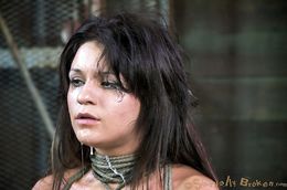 Brutal tit bondage for an innocent brunette