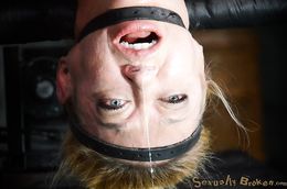 Extreme bondage and hardcore face fucking with a busty girl