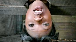 Suspended athletic ebony with a white dick in the mouth